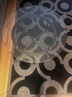Round glass coffee table 38 inch diameter.