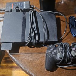 Mini Playstation  2 all wires included + memory card+ controller 