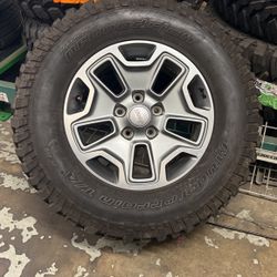 1  17 Inch Jeep Wheel And Tire Good Condition