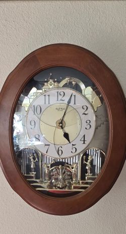 Rhythm "Nostalgia" Series Magic Motion Musical Wall Clock