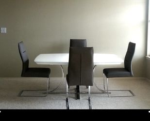 White dining room table and chairs
