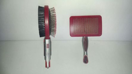 2 like new pet grooming brushes