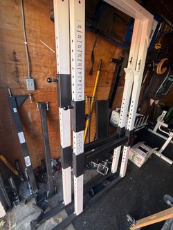 Parabody squat rack with pull up bar.