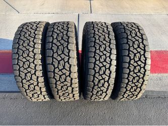 Toyo AT 275/70/18 tires load range E with 100% life