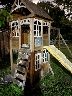KidKraft Wooden Swing Set with Playhouse, Slide & Swings