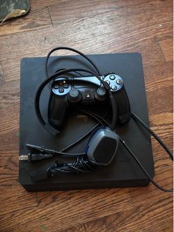 PlayStation 4 with controller and headset