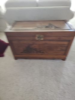 Wooden Storage Chest with Carved Panels