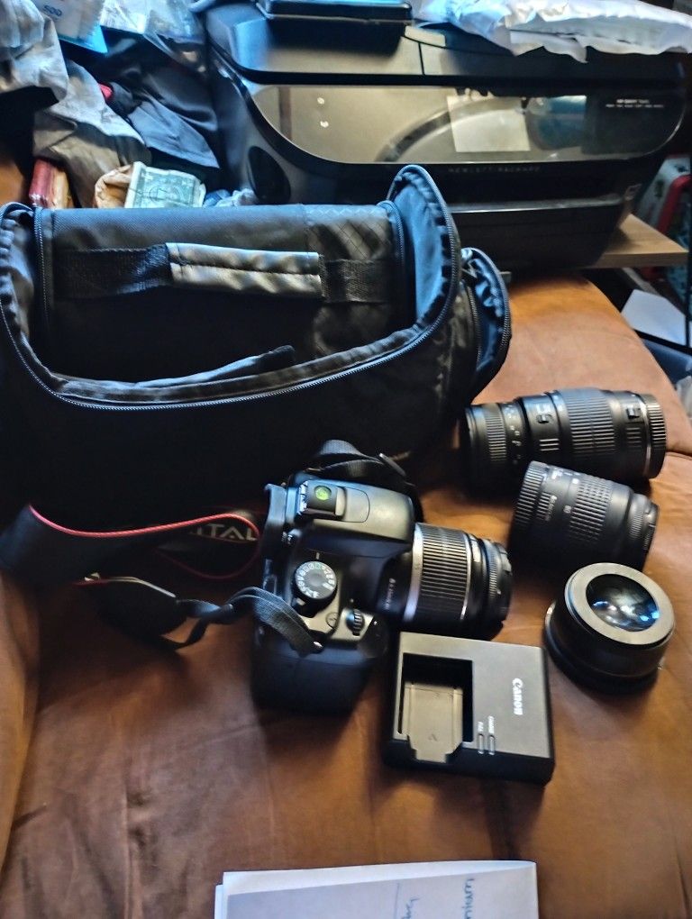 Cannon With 3 Lenses N Charger N Bag Included