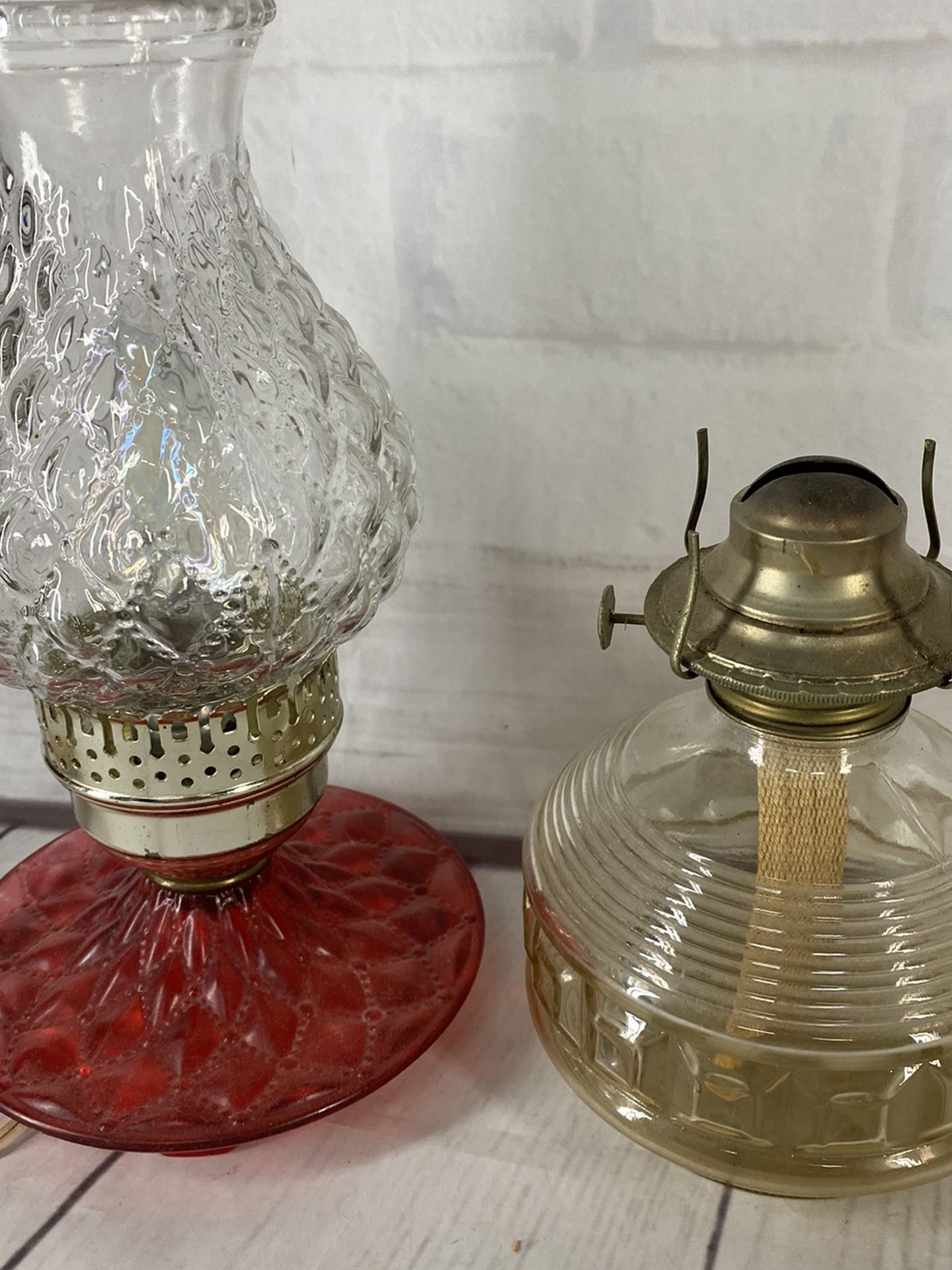 Vintage oil lamps one converted to electricity Beautiful glass pieces with a great look can deliver