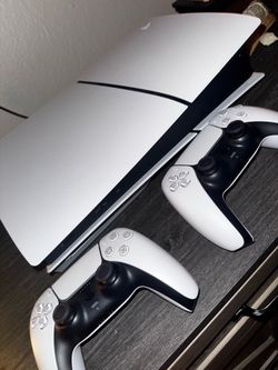 PS5 with two controllers