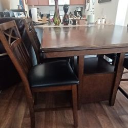 $ 75 Table 4 chairs  