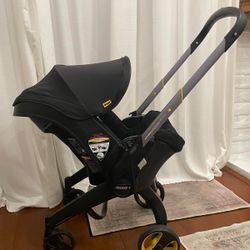 Doona Convertible Infant Carseat & BASE (Accessories INCLUDED)