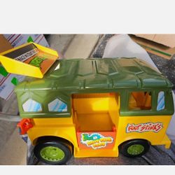 Vintage 1988 TMNT Ninja Turtles party wagon and pizza thrower