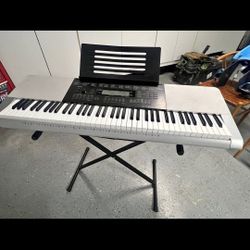 Casio Keyboard With Stand 150.00