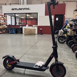 Front and rear shock-absorbing electric scooters