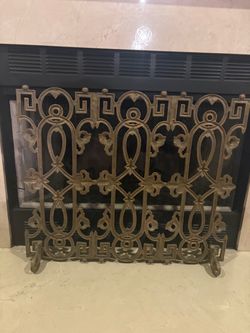 Ornate fireplace screen