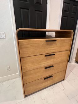 Well made heavy tall dresser with lots of storage space