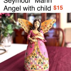 Vintage Seymour Mann Angel with child wood carved look . Great Christmas gift or decor