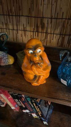 Vintage orange monkey figure