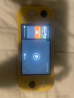 Used   Factory reset yellow Nintendo switch lite