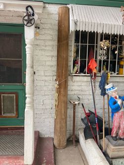 Antique tall wooden pillar