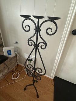 Cast iron candle stand