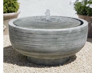 Grey large cement fountain