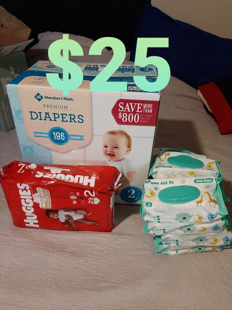 Size 2 Diapers & 11 Packs Of Wipes