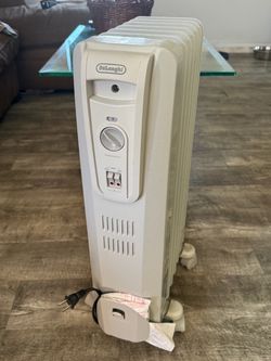 Delonghi Space Heater: No Damage, Clean