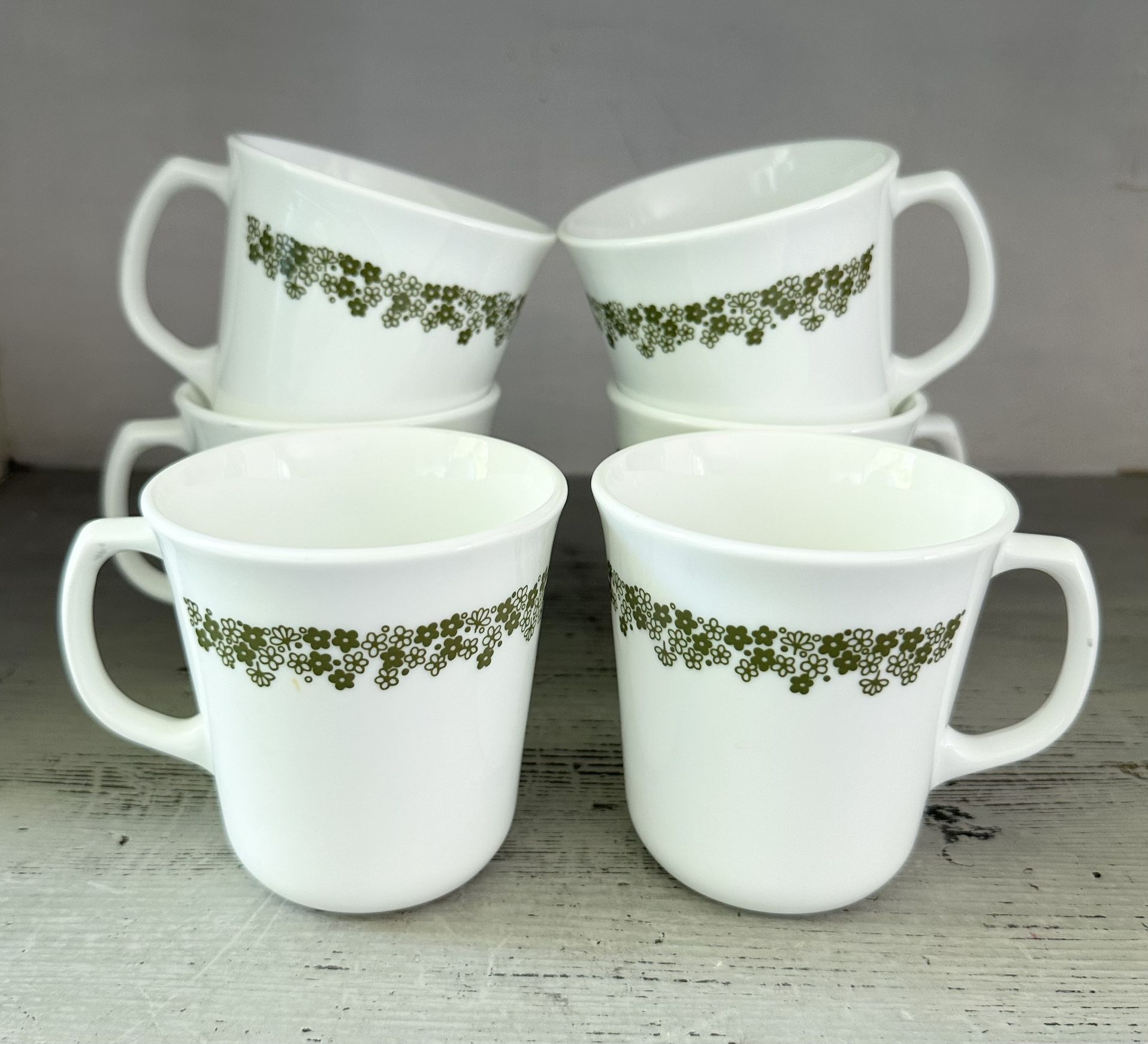 Set of 6 vintage Corning spring blossom 10 ounce  D handle mugs. Coordinates with the Pyrex line of spring blossom dishes 