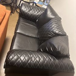 2 Black leather Sofas 