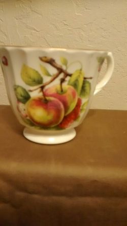 Crown Trent tea cup with Orchard design. Fine bone china made in England
