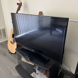 Samsung 40” TV with Roku Stick