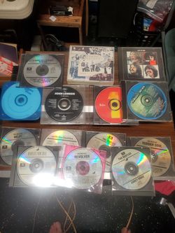 BEATLES  CDs collection of 15 CD s some mixed covers some original.  comes with 2 10 disc shuttle cd box for sony