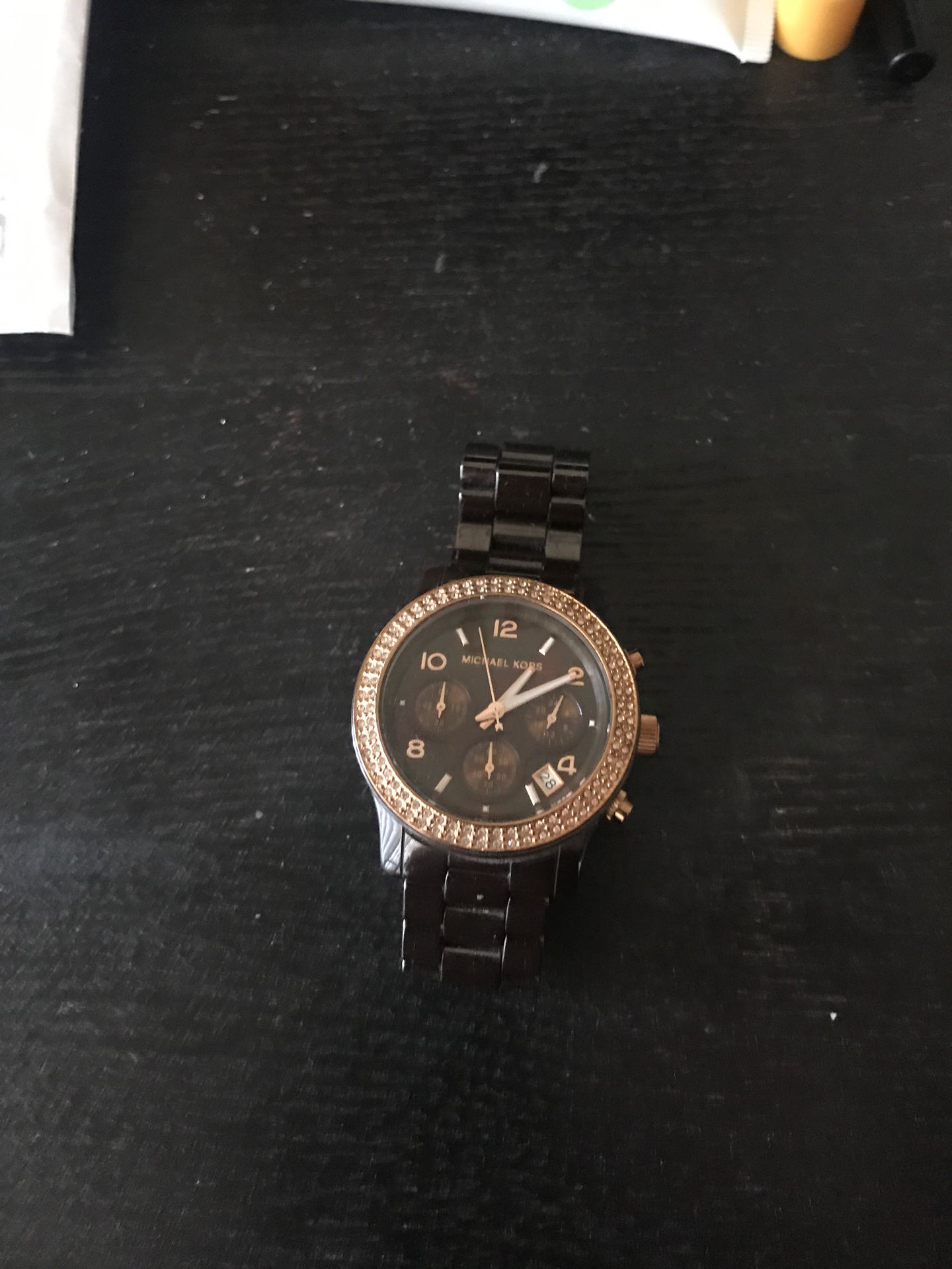 Brown and gold MK watch