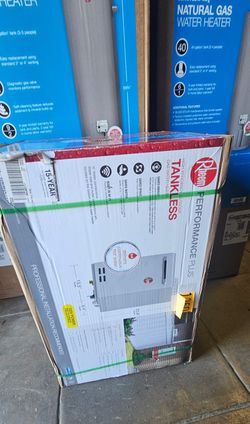 NEW TANKLESS RHEEM WATER HEATER