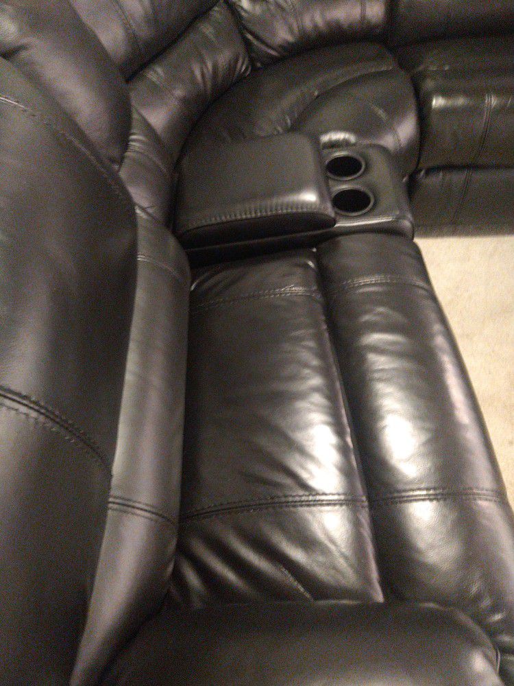 SECTIONAL GENUINE LEATHER RECLINER ELECTRIC BLACK COLOR..DELIVERY SERVICE AVAILABLE..