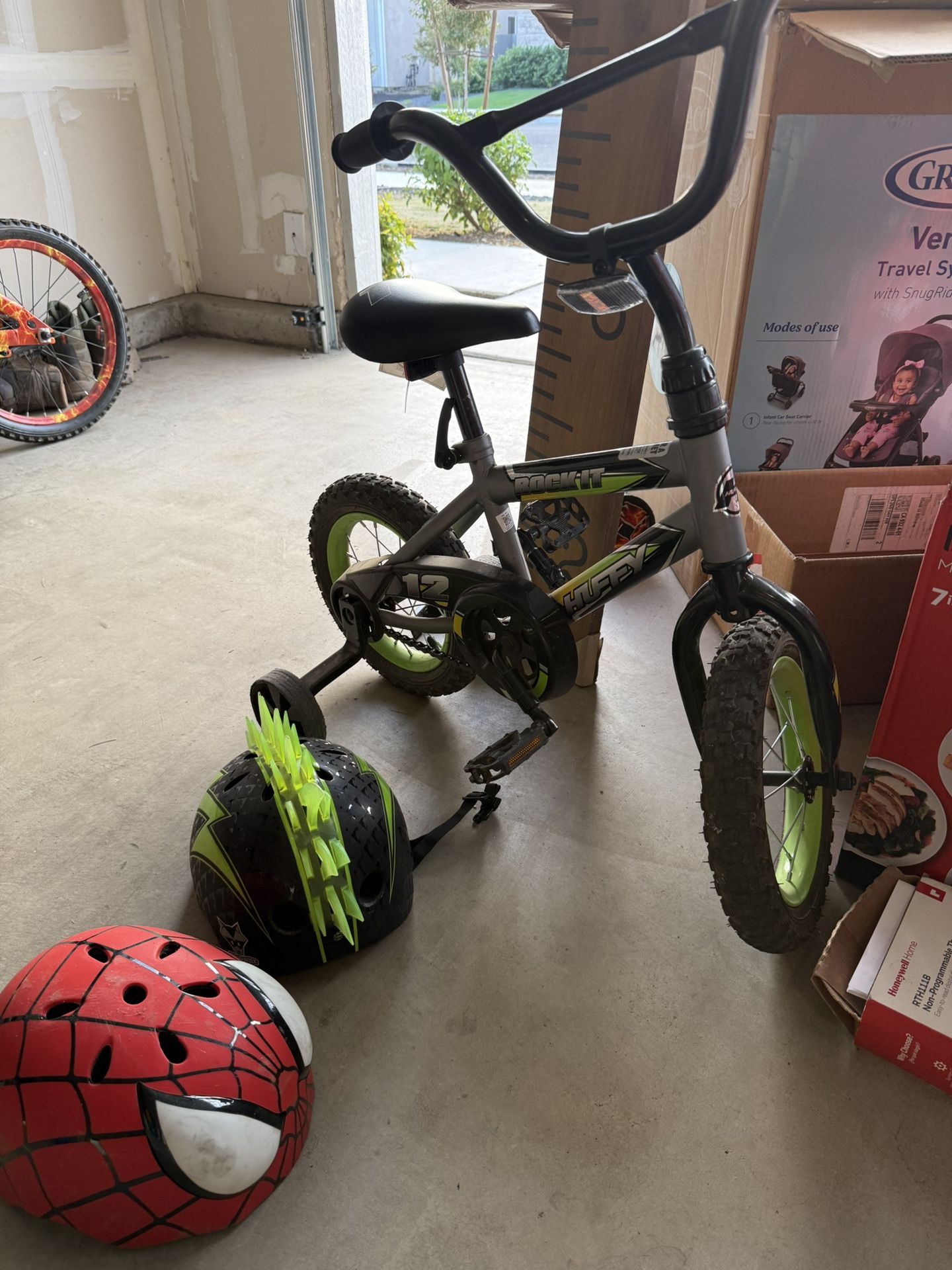 12 Inch Huffy Bike And 2 Youth Helmets