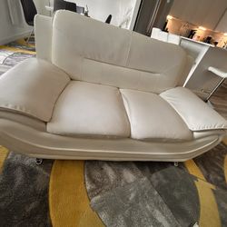 White Leather Couch Set Up Two