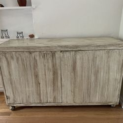 Cabinet With Folding Doors And Wheels