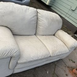 Beige loveseat 