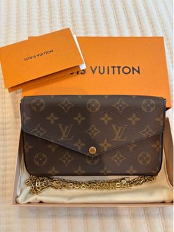 Pochette Félicie - Louis Vuitton monogram clutch.