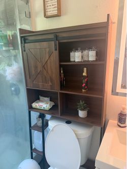 Toilet storage cabinet