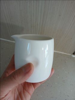 Mini white ceramic milk pitcher for latte, cream jug, or sauce pourer