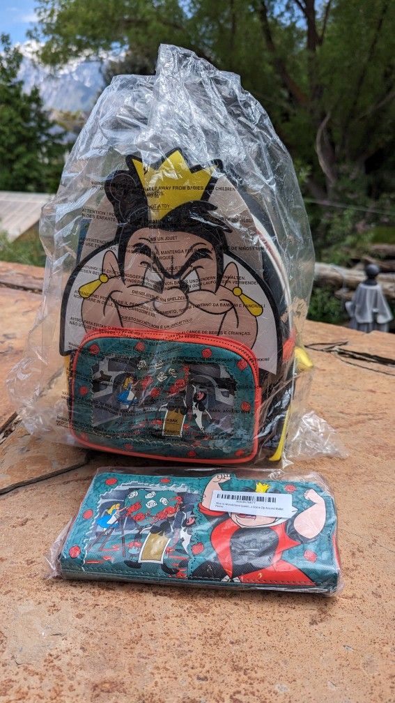 Loungefly Disney Alice in Wonderland Red Queen Backpack and Wallet set
In perfect brand new condition.