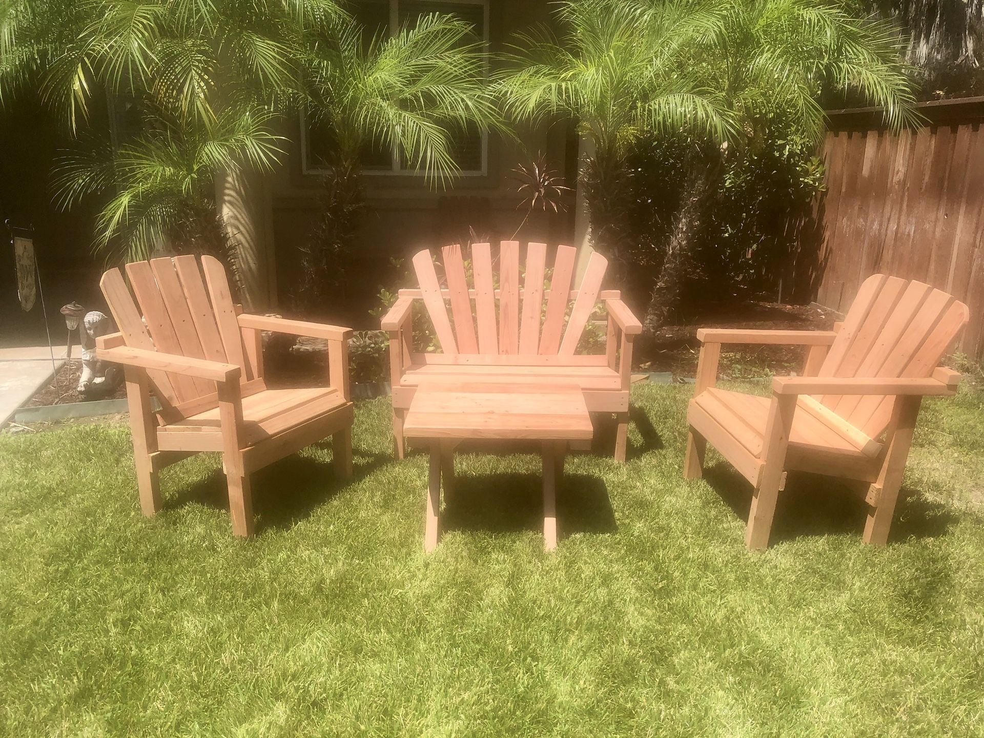 4 piece set of Redwood outdoor furniture, new furniture, all hand made, sanded to smooth finish, all 4 pieces $100.00 delivery available,