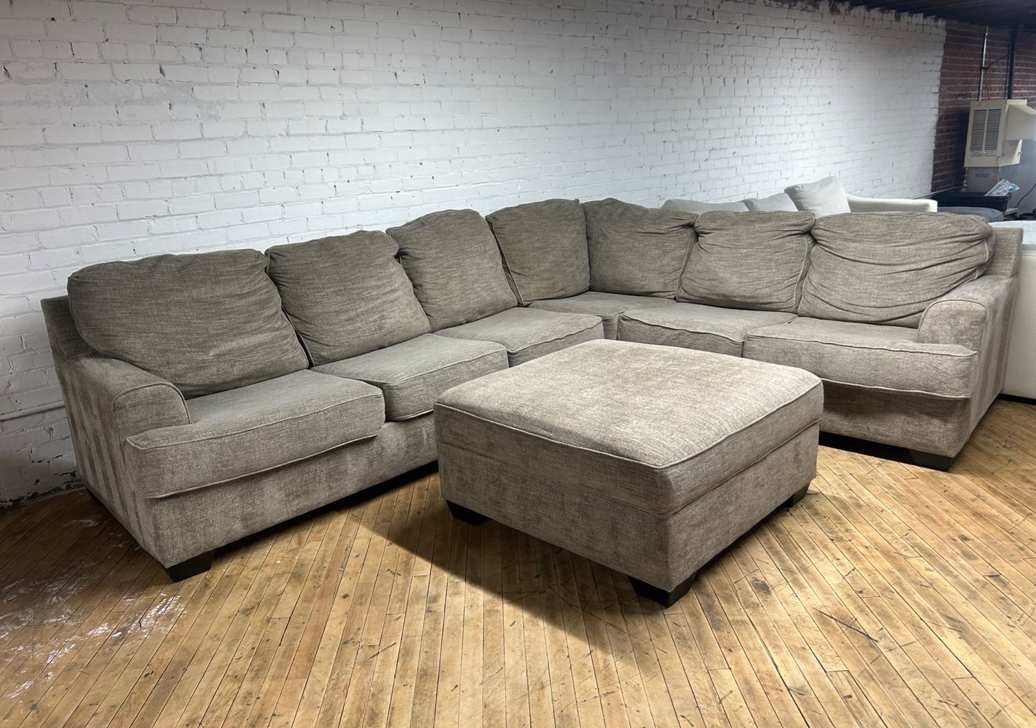Delivery Available Ashley L shape sectional couch and ottoman