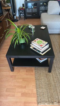 Wide big table for the living room with bottom shelf