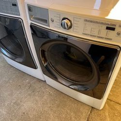 Kenmore elite gas front load washer and dryer set with three months warranty free delivery in Oakland area outside of Oakland there a charge depends o