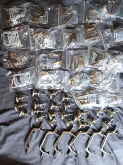 47 cabinet or dresser handles knobs and pulls. Brushed nickle / silver and bronze